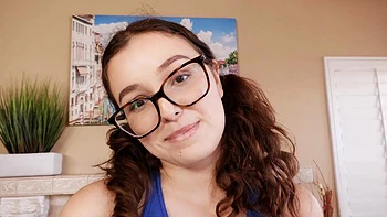 Brunette Leana fucks with shaved pussy and glasses