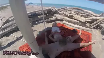 Risky Public Handjob on the Canary Beach Caught reading a book - MissCreamy