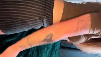 Voluptuous Blonde Flaunts Body in Short Dress