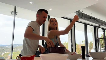 The blonde beauty Nata Ocean has sex with a guy in the kitchen.