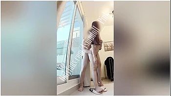 Asian Couple Sex In In Front Of The Window